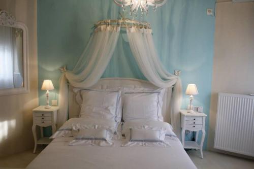 Säng eller sängar i ett rum på Chiqui luxury apartments