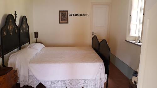 Postel nebo postele na pokoji v ubytování La Casa del Mandorlo