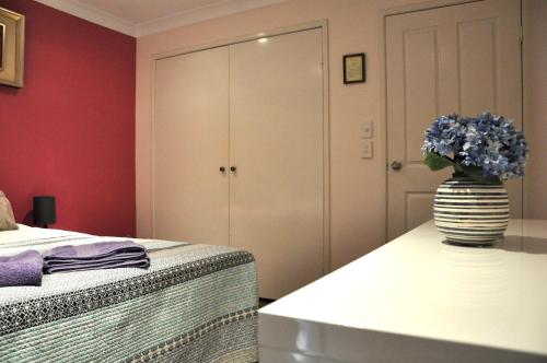 Cama o camas de una habitación en TL Warmest Homestay