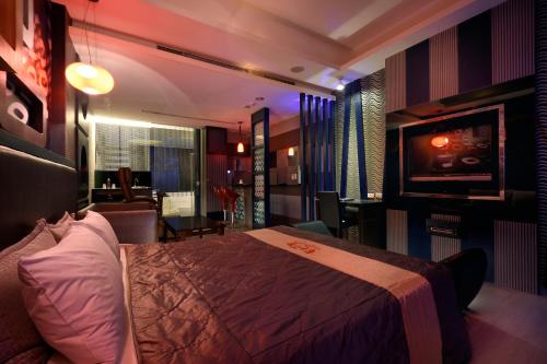 Katil atau katil-katil dalam bilik di Sun Garden Motel