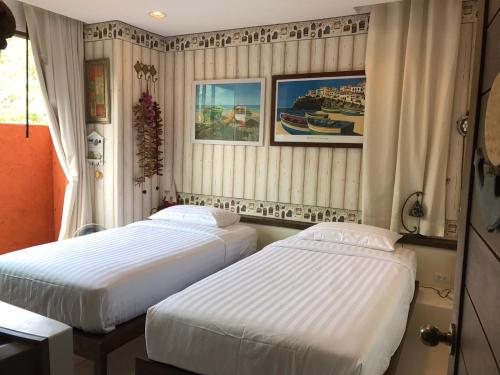 Giường trong phòng chung tại Mexican Beachfront Condo