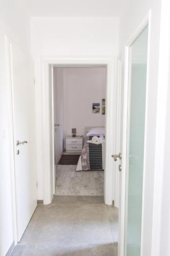 Katil atau katil-katil dalam bilik di Apartmani Žorić