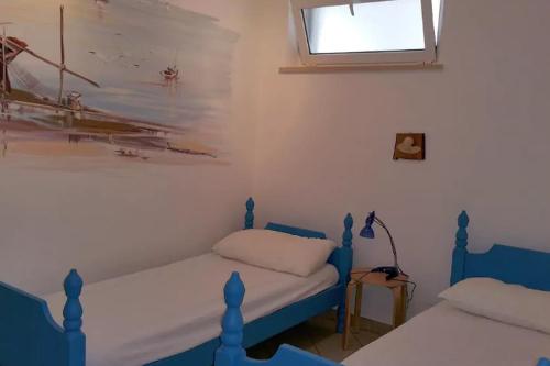 Ένα ή περισσότερα κρεβάτια σε δωμάτιο στο Residence Horisontis
