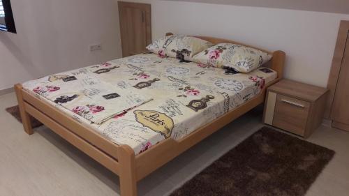 Кровать или кровати в номере Apartment Valentina