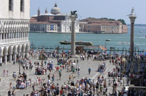 a large group of people walking around a city at Best Windows in Venice