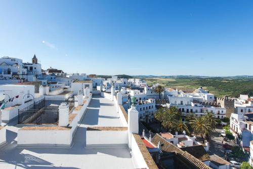 a view of a city from the roof of a building at La Botica de Vejer in Vejer de la Frontera