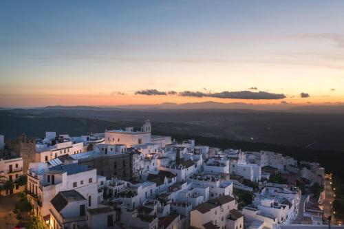 an aerial view of a city at sunset at La Botica de Vejer in Vejer de la Frontera