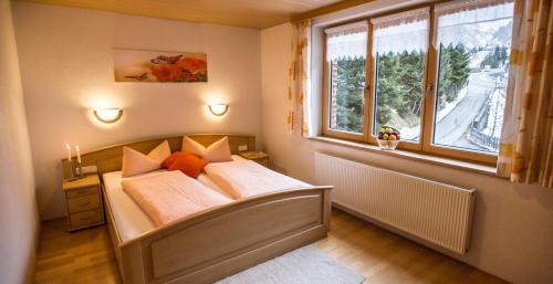 Postel nebo postele na pokoji v ubytování Haus Annette