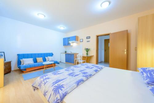 Posteľ alebo postele v izbe v ubytovaní Apartments Red Coral Cavtat