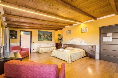 Postel nebo postele na pokoji v ubytování Villa Gengi