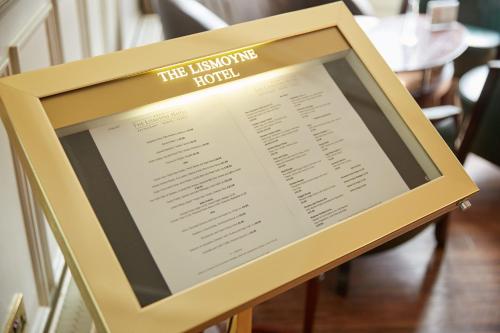 a menu for the lunchroom hotel on a table at Lismoyne Hotel in Fleet