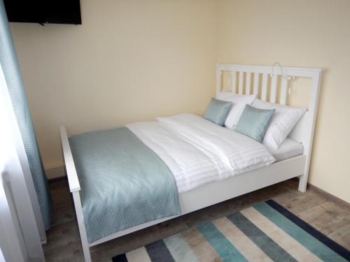 Katil atau katil-katil dalam bilik di Apartamenty Przystań