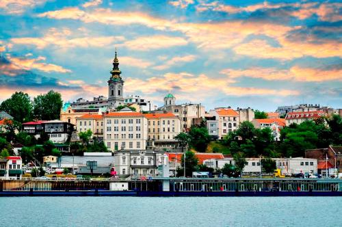 a view of a city from the water at Manjež Centar in Belgrade