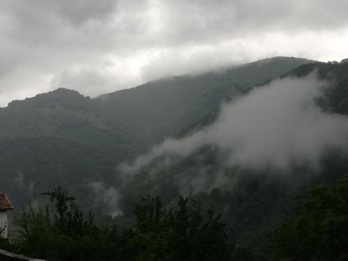 a mountain range with a sky background at Hostal Ezkurra in Ezkurra