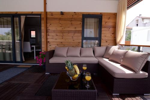 Et opholdsområde på Tomica Apartments with Pool