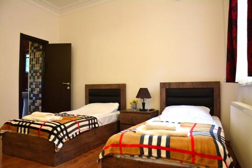 Postel nebo postele na pokoji v ubytování Hotel Canyon