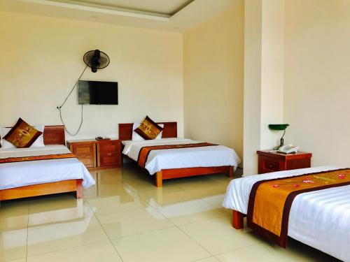Katil atau katil-katil dalam bilik di Binh Minh Hotel