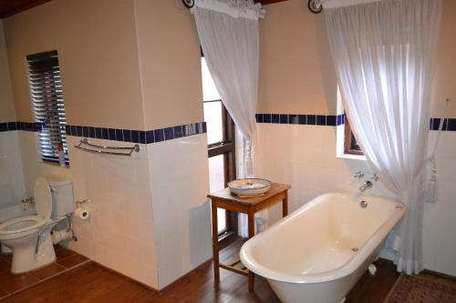 Koupelna v ubytování Foxwood House Boutique Hotel