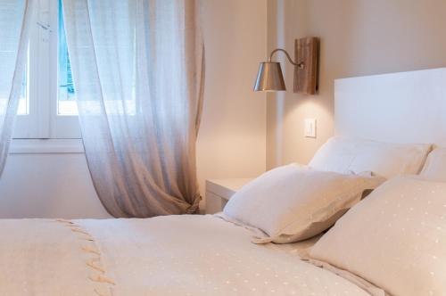 Ένα ή περισσότερα κρεβάτια σε δωμάτιο στο Gian Paul Hotel