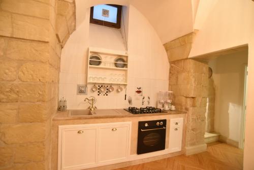 Kuchyň nebo kuchyňský kout v ubytování Cadelli Luxury Suite & Apartments