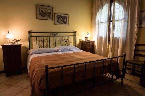 Кровать или кровати в номере Agriturismo Il Giglio