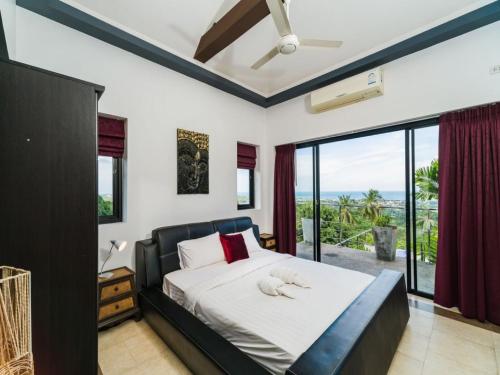 Ліжко або ліжка в номері 4 Bedroom Seaview 1 Chaweng Noi SDV161-By Samui Dream Villas