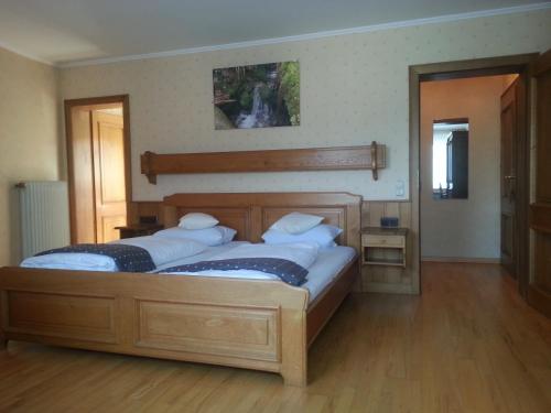 Ein Bett oder Betten in einem Zimmer der Unterkunft Hotel Ritschlay