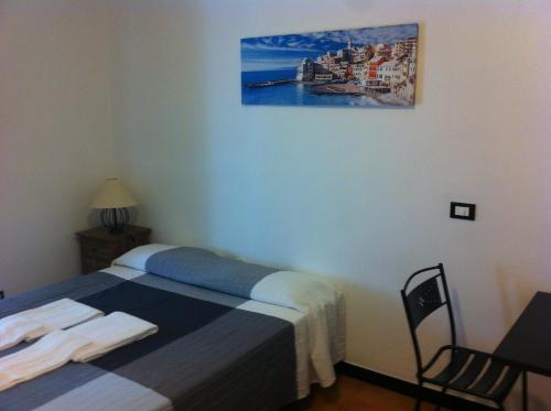 Un pat sau paturi într-o cameră la Albergo Panson