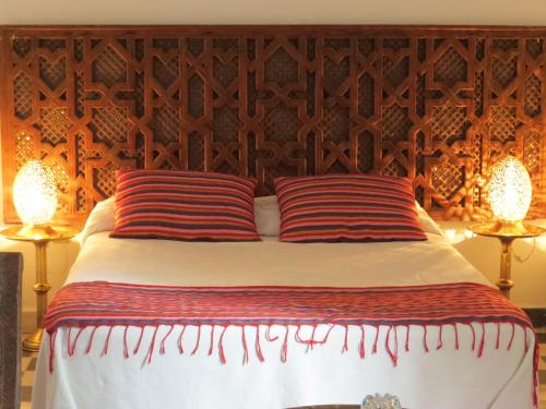 Cama ou camas em um quarto em Riad Arous Chamel