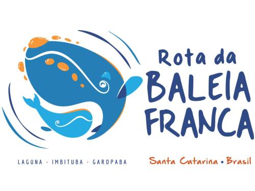 a label for a seafood restaurant with a blue fish at Silvestre Praia Hotel in Imbituba