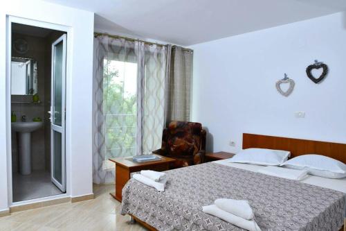 Ένα ή περισσότερα κρεβάτια σε δωμάτιο στο Casa Kmy