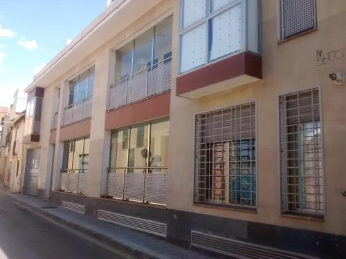 a building on the side of a street at Apartamento Turistico Dct. Creus in Guadalajara