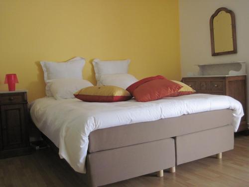 Postel nebo postele na pokoji v ubytování B&B Le Verger du Pierroy