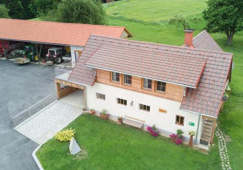 an overhead view of a house with a red roof at Promschhof in Semriach