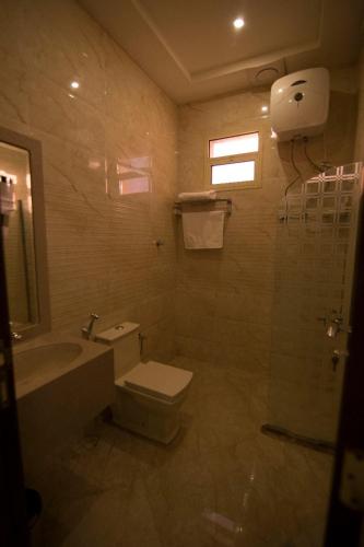 Koupelna v ubytování Elaf Aparthotel