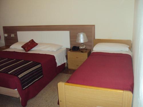 Ліжко або ліжка в номері Hotel Mirage