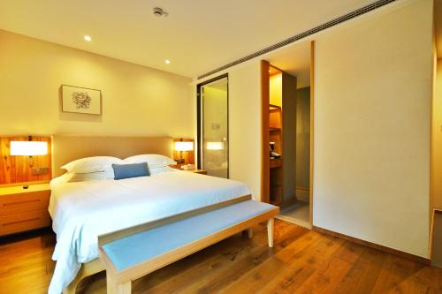Postel nebo postele na pokoji v ubytování Cozylife Hotel Westlake
