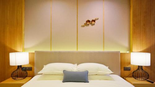 Postel nebo postele na pokoji v ubytování Cozylife Hotel Westlake