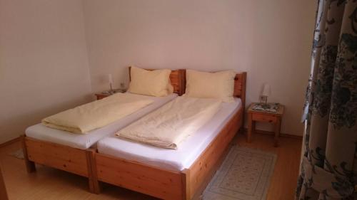 Cama ou camas em um quarto em Gartler's Ferienhaus