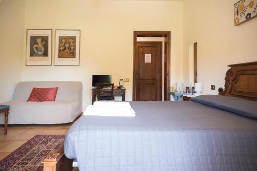 Posteľ alebo postele v izbe v ubytovaní B&B San Russorio