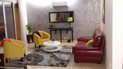 Χώρος καθιστικού στο Maison Katia