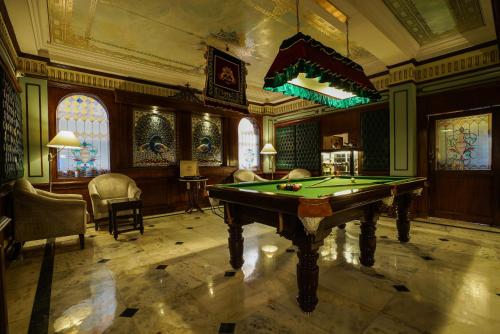 a billiard room with a pool table in it at Shahpura House in Jaipur