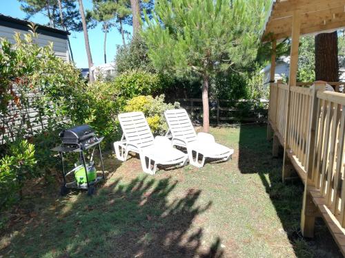 Mobile Home vue baie dans une forêt de pins - La Palmyre