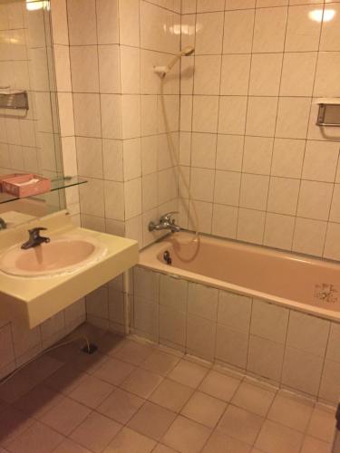 Kylpyhuone majoituspaikassa Bazhong Sentosa Hotel