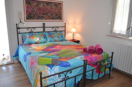 En eller flere senge i et værelse på Il Giardino