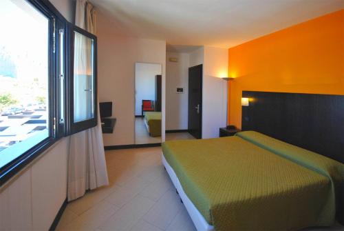 Katil atau katil-katil dalam bilik di Villa Faro B&B