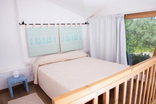 Postel nebo postele na pokoji v ubytování Via dei Mari Guest House
