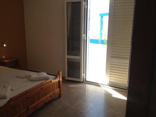 Ένα ή περισσότερα κρεβάτια σε δωμάτιο στο Creta Sun Apartments