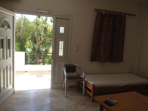 Ένα ή περισσότερα κρεβάτια σε δωμάτιο στο Creta Sun Apartments