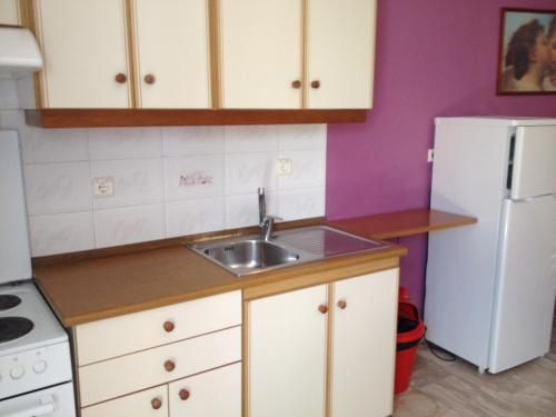 Η κουζίνα ή μικρή κουζίνα στο Creta Sun Apartments